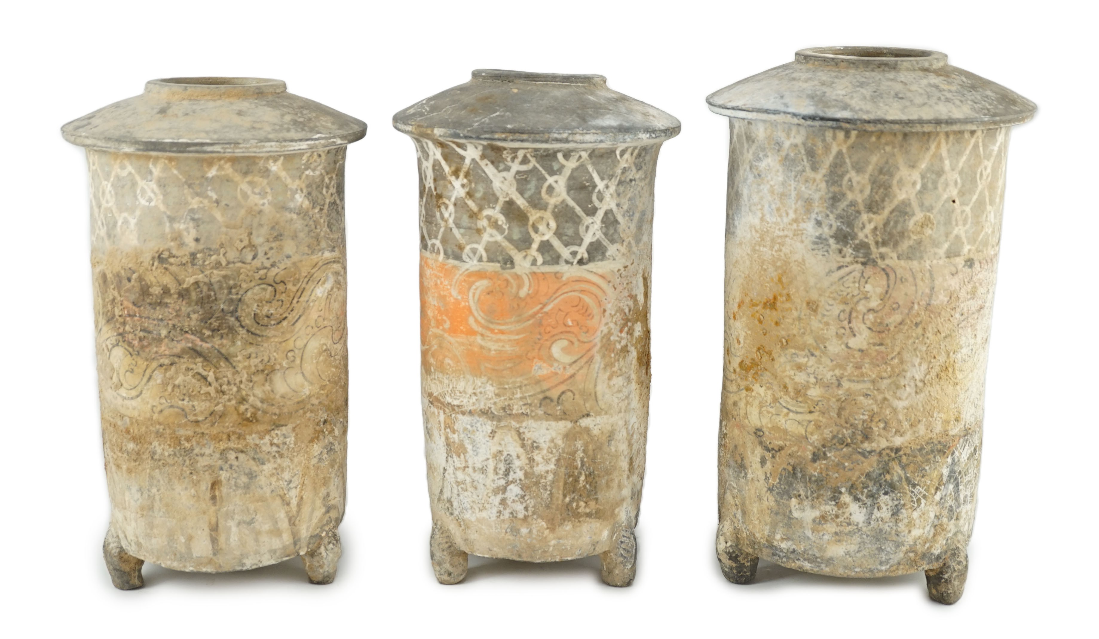 Three Chinese pigment painted grey pottery ‘granary’ jars, Han dynasty (200BCE - 220CE), 29.5 and 32cm high